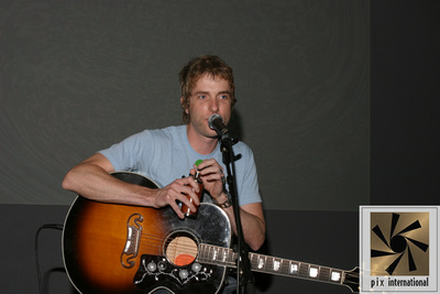 Caviar performs at The Apple store in Chicago